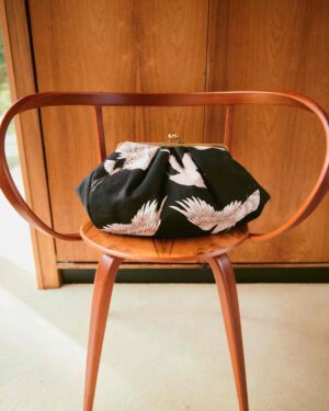 ONE HUNDRED STARS LOCK CLUTCH BAG BLACK KISS